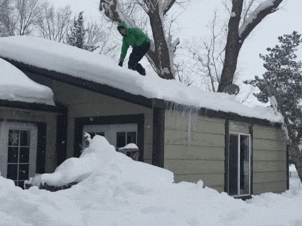 jumping off the roof on my snowboard
